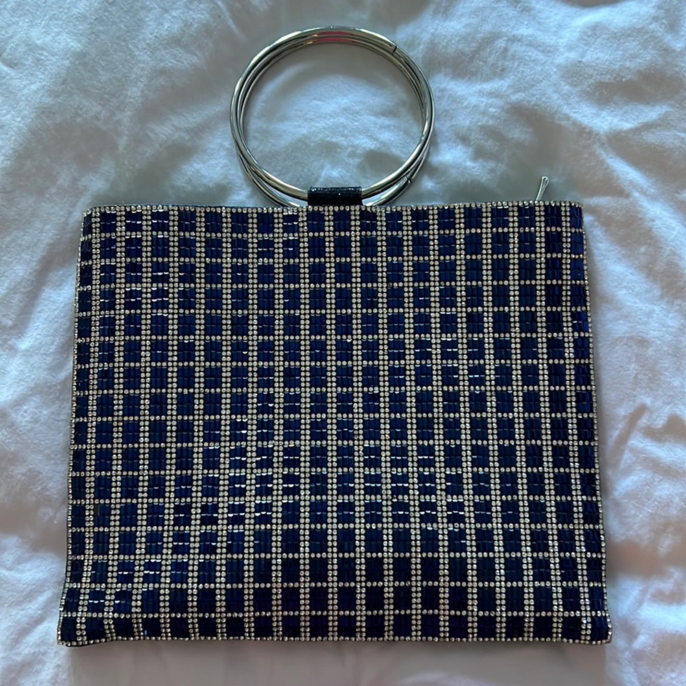 Nina Sadia clutch in navy and clear rhinestones.